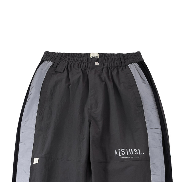 A[S]USL REFLECTIVE LOGO TRACK PANTS