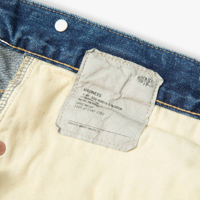 MADNESS HARD AGING DENIM PANTS. RELAXED