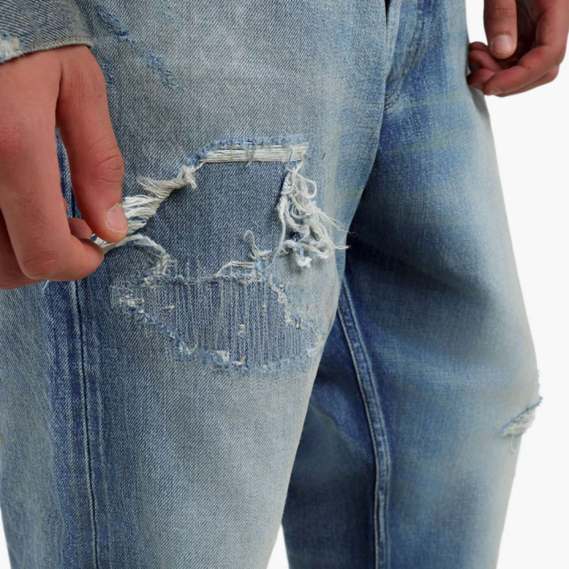 MADNESS HARD AGING DENIM PANTS. RELAXED