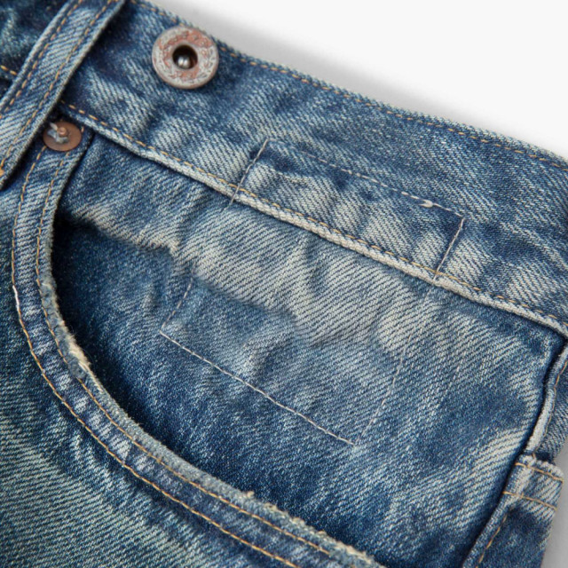 MADNESS HARD AGING DENIM PANTS. RELAXED