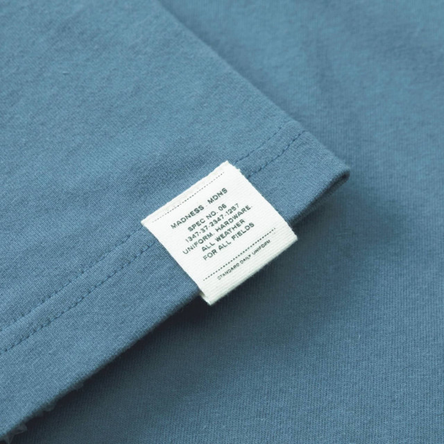 MADNESS BADGE (S) UNIFORM T-SHIRT